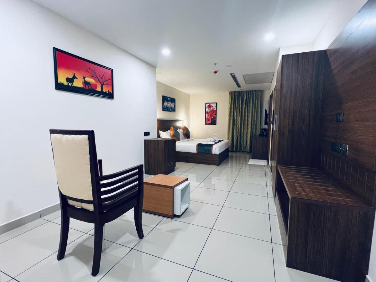 Hotel Seapark Kollam Esterno foto